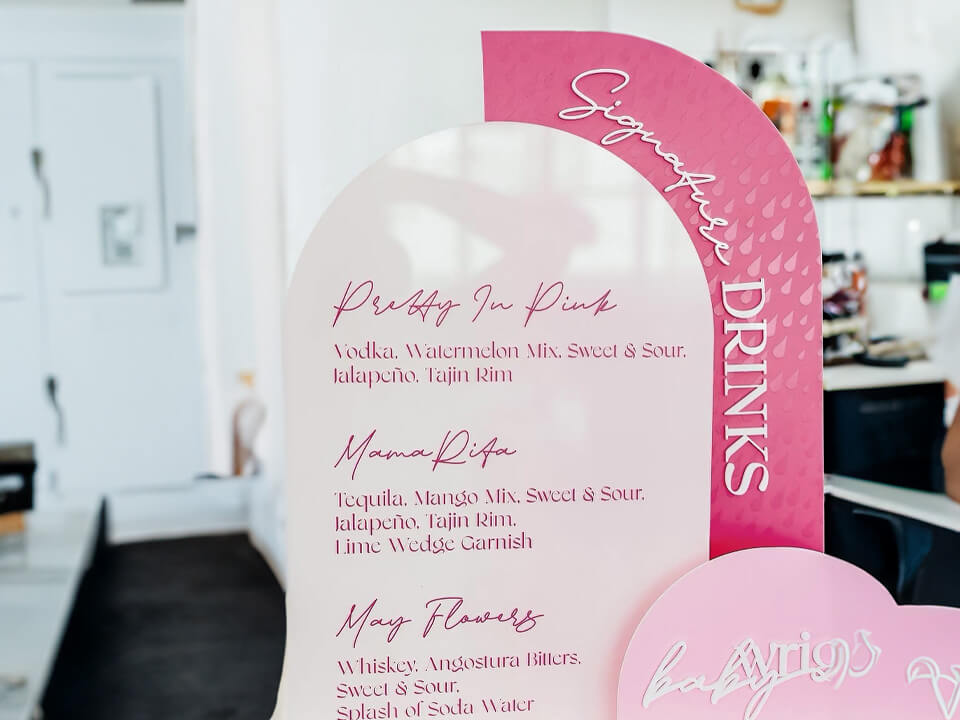 Pink acrylic custom printed drinks menu.