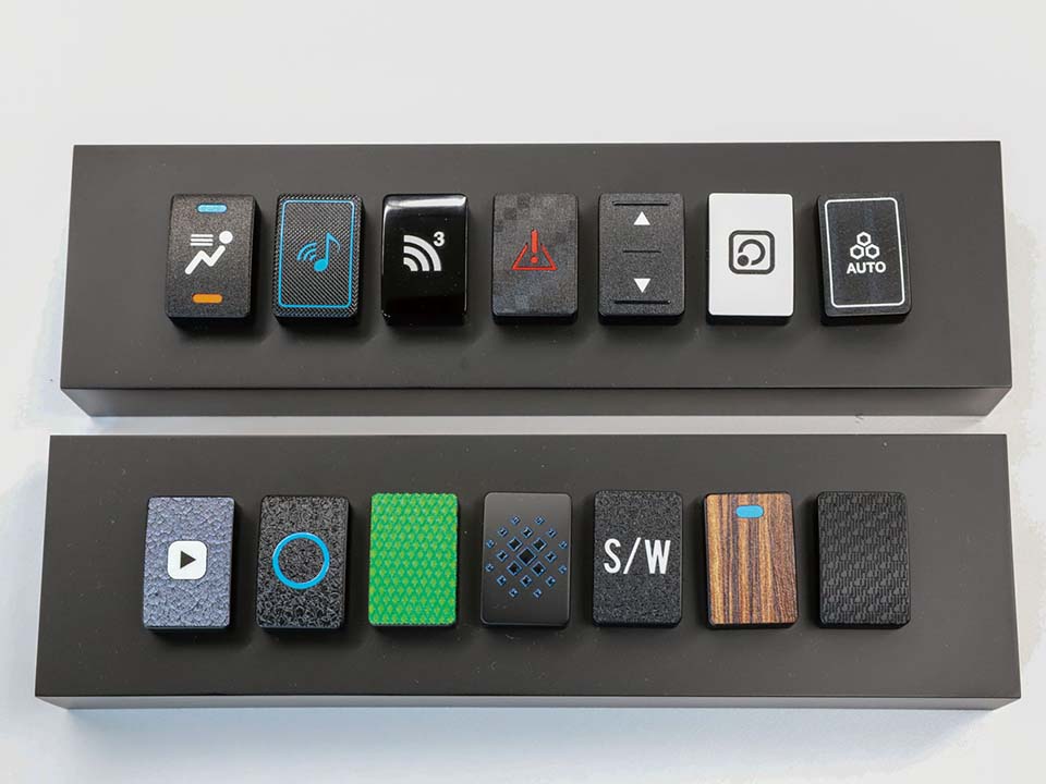 U-jin - image showing U-Jin crew in front of their LEF printers from Roland DG