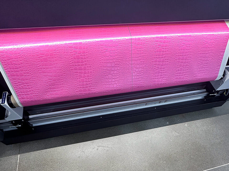 Close up of pink, textured Dimensor S output on the printer.