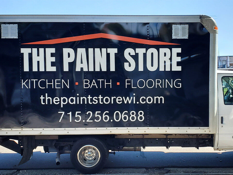 Side view of box truck with "The Paint Store" vehicle graphics.