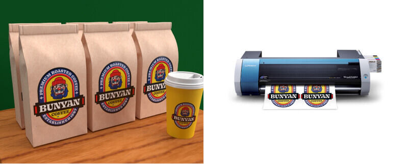 Brown paper bags of coffee with colorful Paul Bunyan Coffee labels next to Roland DG VersaSTUDIO BN-20A digital printer cutter