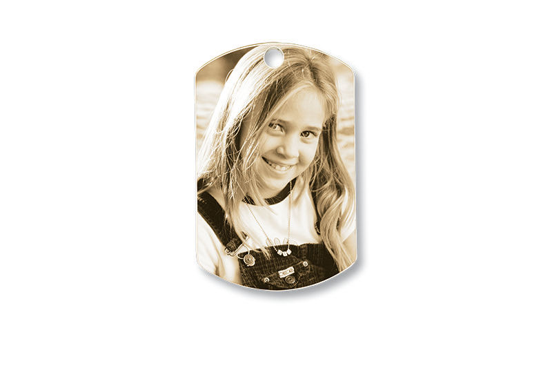 Metal pendant with photo imprint of a young girl