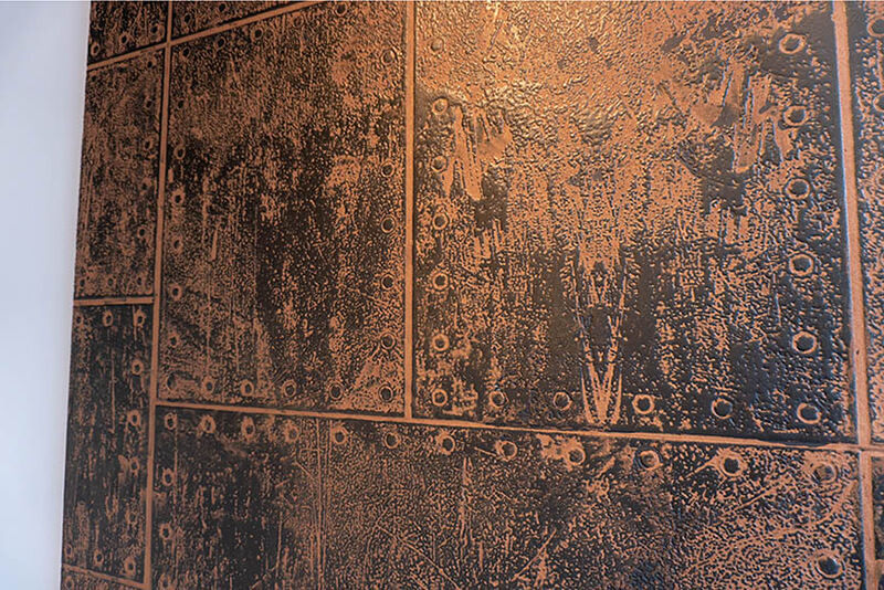 Second close up of simulated steel panels on printed wallcovering.