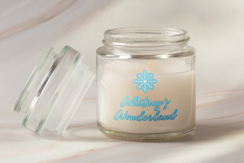 Candle in customized jar with the words "Whitney's Wonderland" 