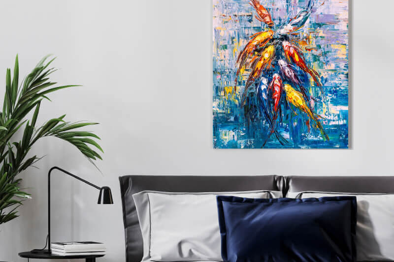 Colorful resin-ink printed canvas print on a wall behind a bedframe