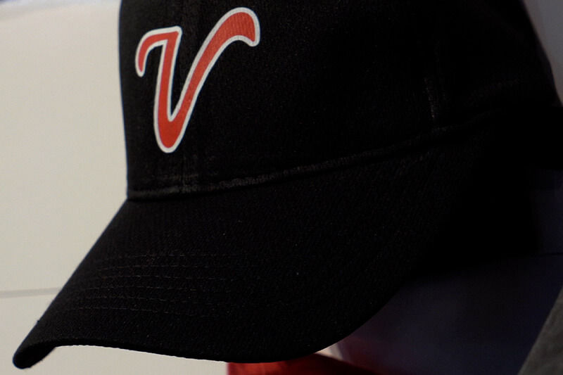 Baseball hat with stylized V graphics.