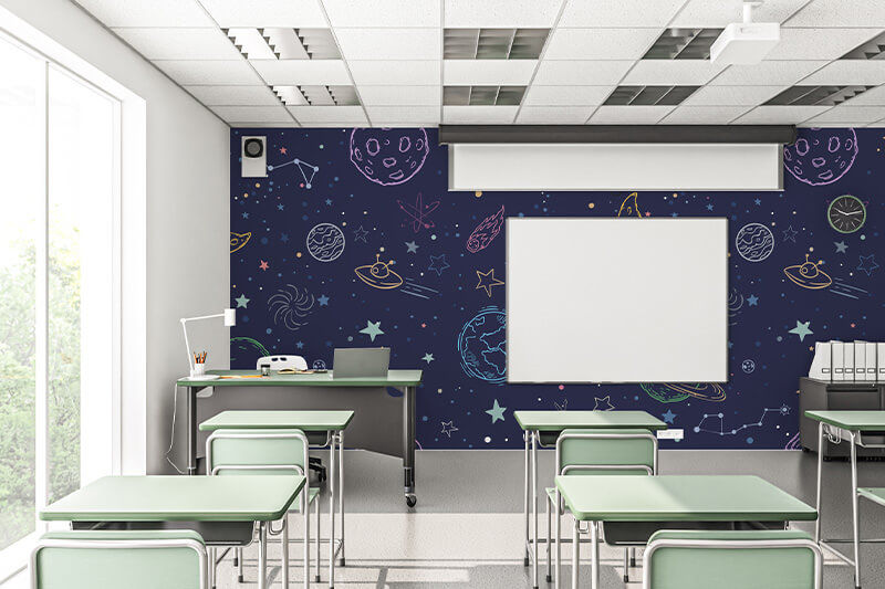 Classroom with the front wall wrapped in galactic graphics printed on a Roland DG AP-640 latex printer.