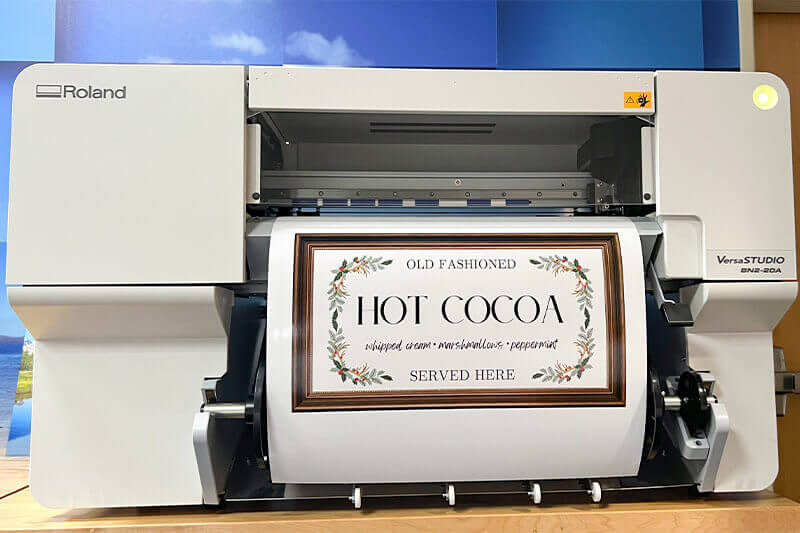 Roland DG BN2-20 printing a hot cocoa sign.