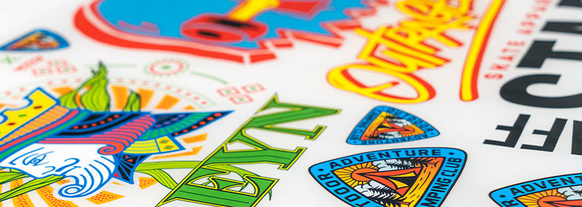 Horizontal view of gang sheet DTF designs for apparel.