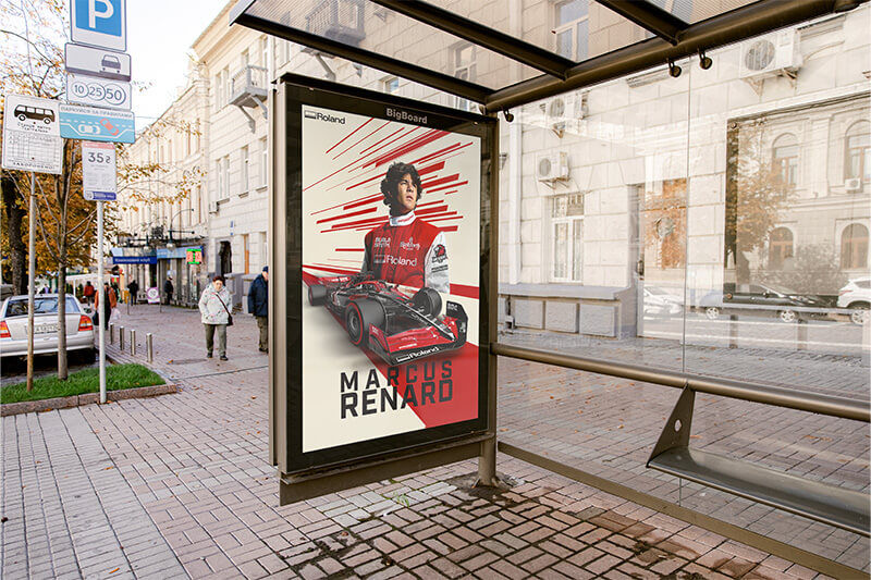 Bus stop with colorful side window poster featuring a race car driver.