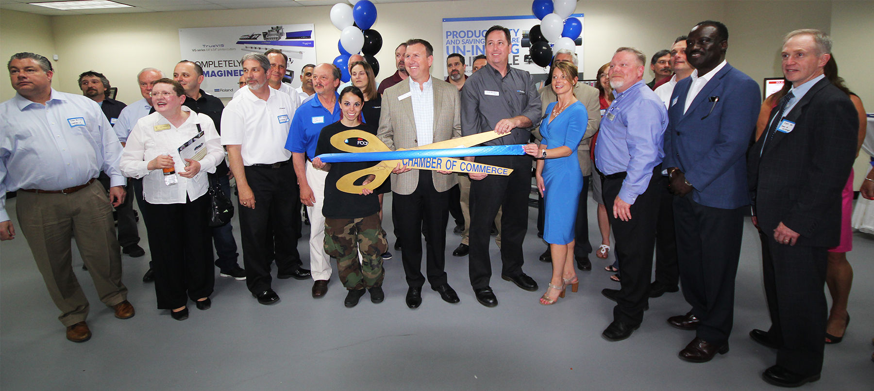 Ribbon-cutting ceremony at Grand Opening ceremony for Roland DGA's new East Coast Imagination Center
