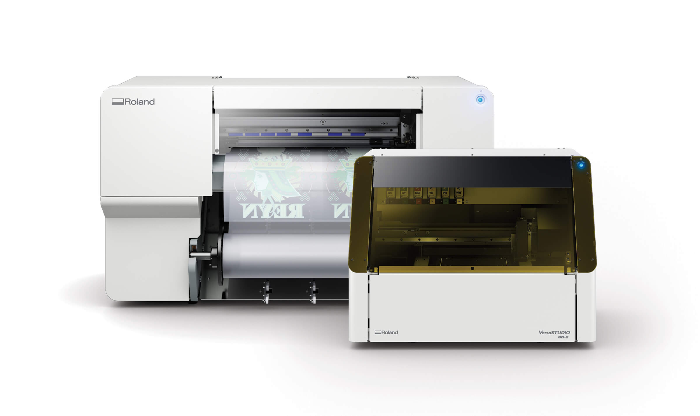 Image of new Roland DG VersaSTUDIO BD-8 desktop UV printer (front right) and new VersaSTUDIO BY-20 direct-to-film printer (rear left) 