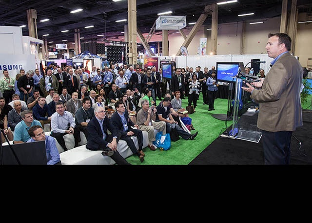 2013 New Roland DGA president, Rick Scrimger, announces at the International Sign Expo, a Roland digital signage solution that will help demystify digital signage for traditional sign shops.