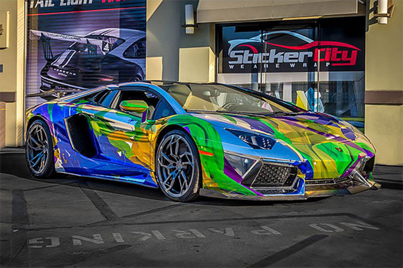 StickerCity of Sherman Oaks, California. Holographic, multi-color vehicle wrap of Lamborghini Aventador Roadster using Roland SOLJET XR-640