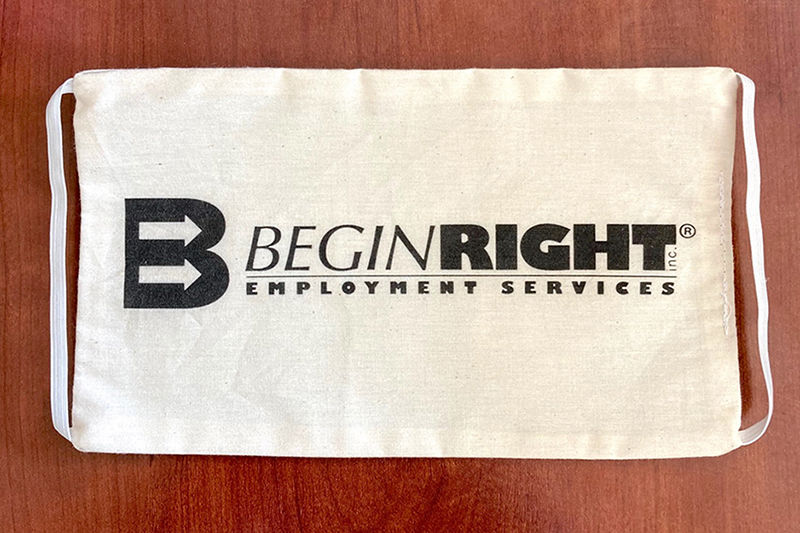 BeginRight Employment Services usa su impresora directo-a-prenda (DTG) BT-12 de Roland DG en la impresión de su logotipo sobre mascarillas de tela como esta.