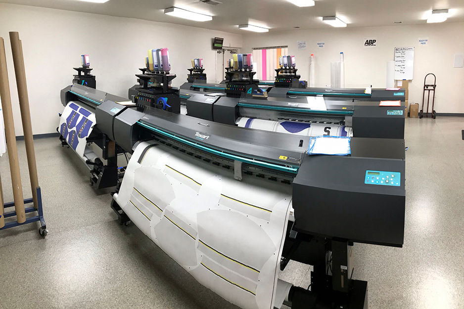 Savi Customs' Roland dye-sublimation printers in action