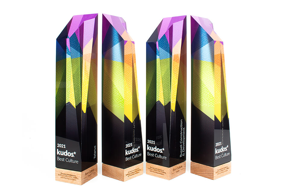 Four wooden rectangular pillar awards with full color printing