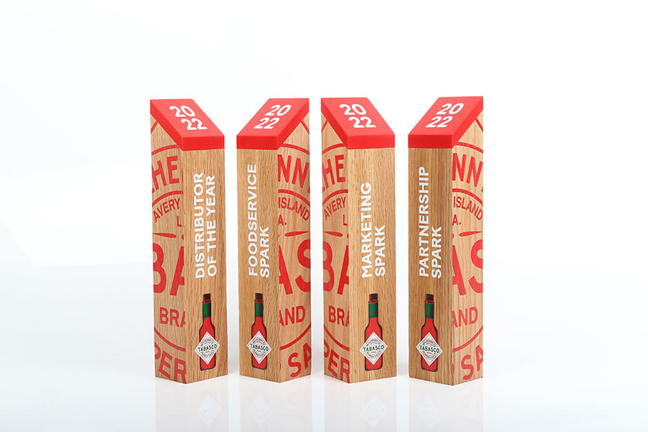 Four rectangular pillar awards for Tabasco, printed with red and white ink