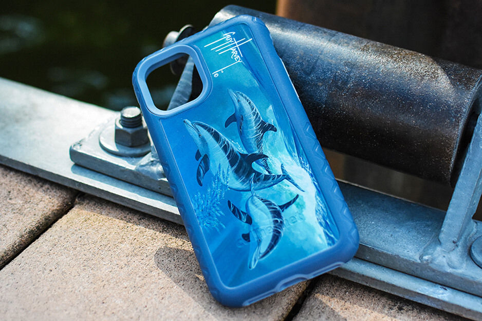 Phone case with blue dolphin  graphic printed on a Roland DG VersaUV LEF2 printer