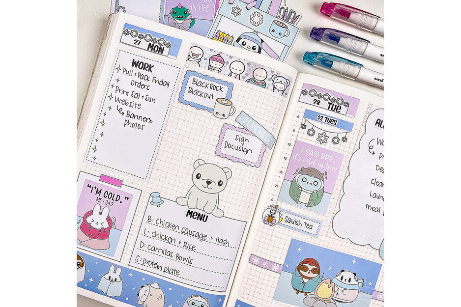 Planner page with multiple character stickers and pens