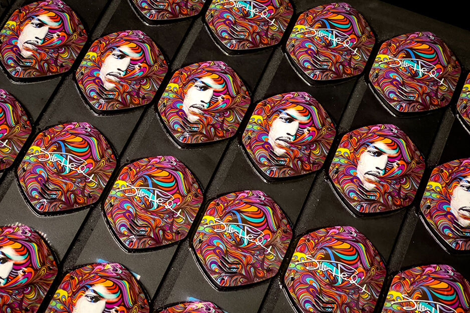 Rows of custom printed Jimi Hendrix graphics for headphones