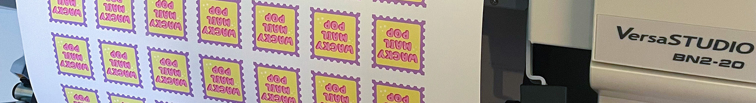 Wacky Mail Pop stickers being printed on a Roland DG BN2-20 digital printer/cutter.