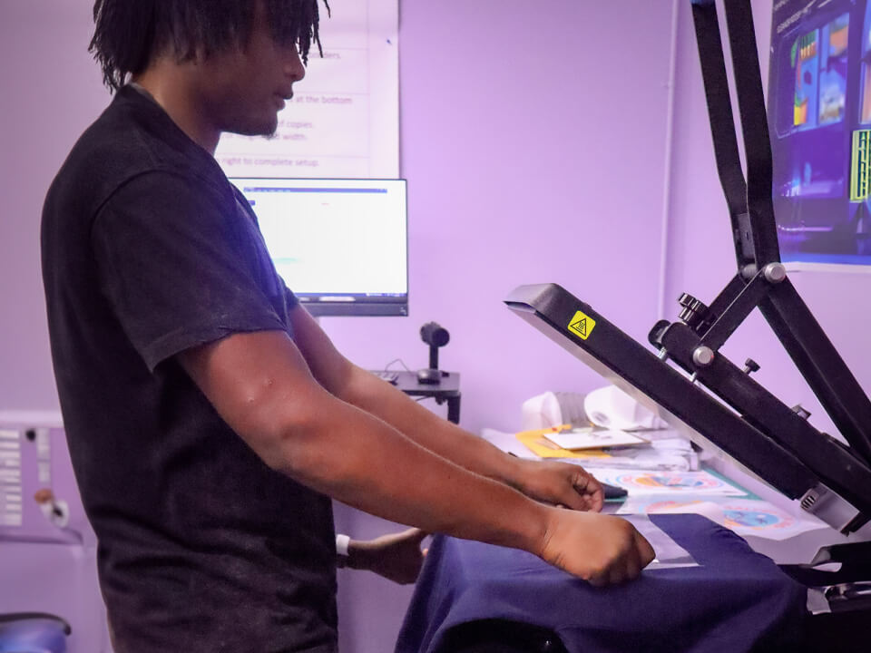 Ball HS Tor_Slider Image_student using heatpress