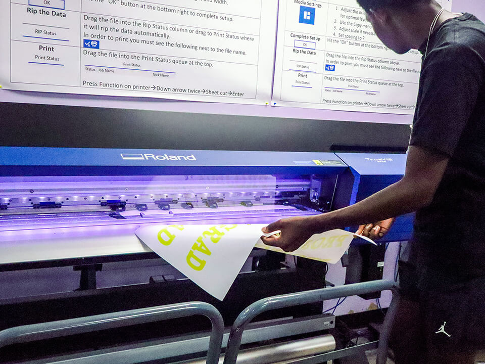 Ball HS Tor_Slider Image_Tor Store student printing graphics on a Roland DG TrueVIS printer/cutter
