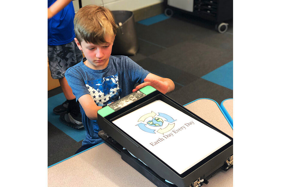 Burrell Elementary students were able to help make their t-shirts on the Roland BT-12 direct-to-garment printer