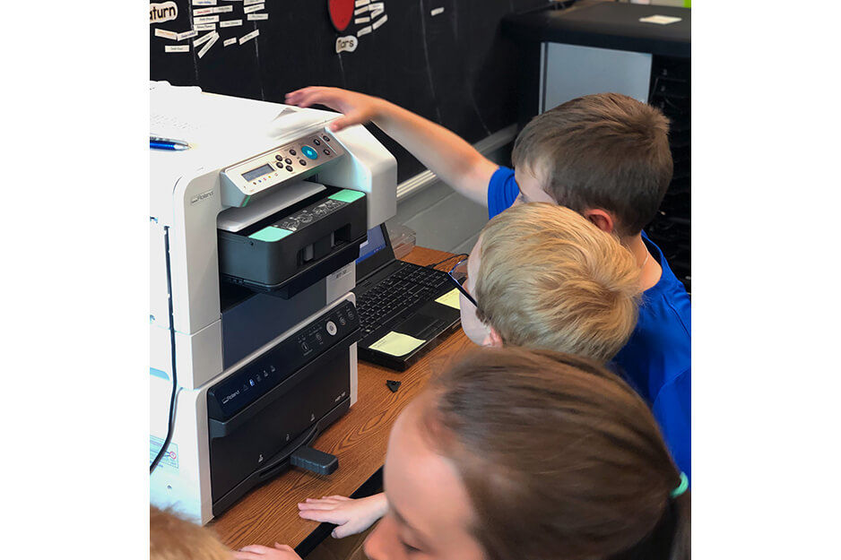 Burrell Elementary students were excited to help make their t-shirts on the Roland BT-12 direct-to-garment printer