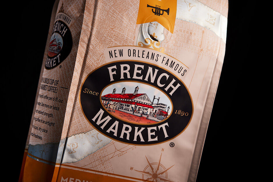 Close up of tan coffee bean bag labelled French Market, produced on a Roland DG UV printer