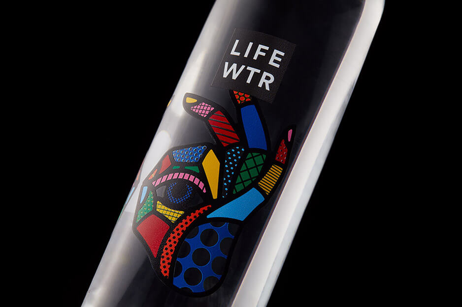 Close up of Life Wtr bottle and its colorful label.