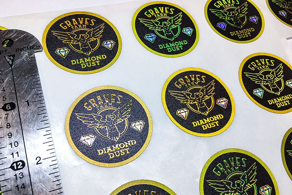 DMS Color produces these round holographic labels on its Roland DG VersaUV LEC2-300 UV printer.