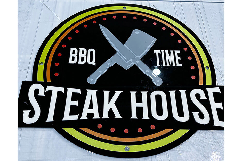 Circular BBQ Time Steakhouse logo sign