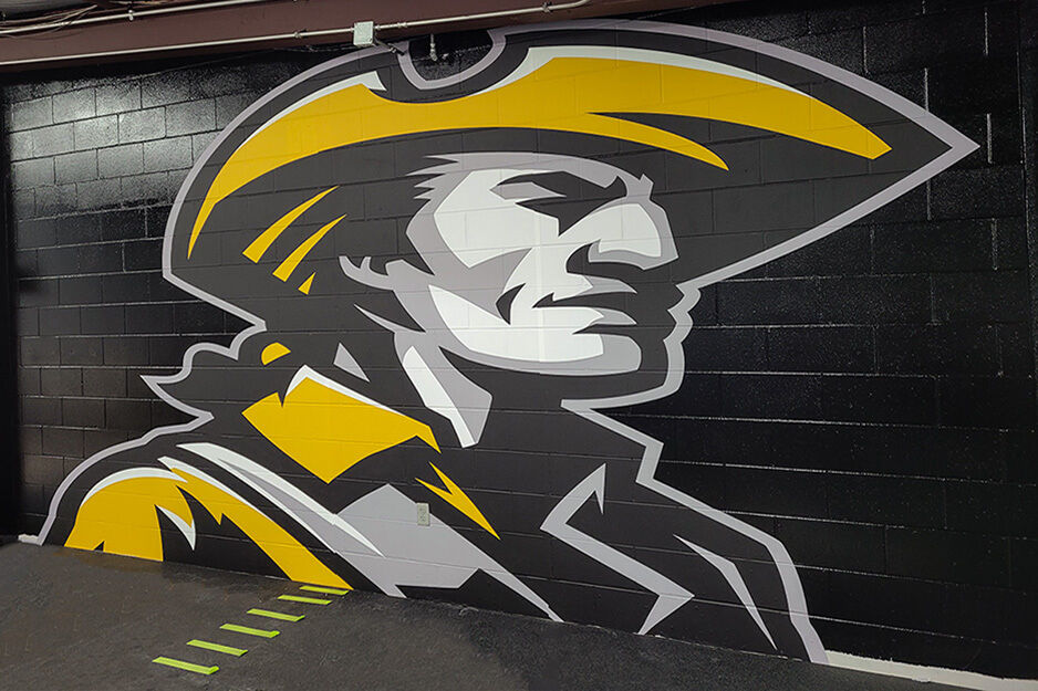 413 Signs and Graphics created this yellow and black pioneer wall wrap with help from its Roland DG TrueVIS VG2 wide-format printer/cutter.