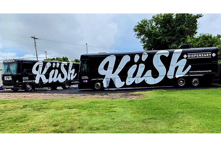 These two black busses with Kush company graphics were produced by 413 Signs and Graphics on its Roland DG TrueVIS VG2 wide-format printer/cutter.