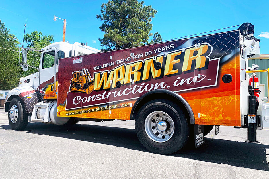 Advanced Sign printed this vibrant truck wrap for Warner Construction on its Roland DG wide-format printer/cutter.