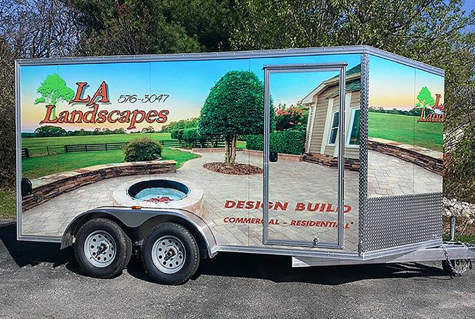 LA Landscapes trailer covered in colorful graphics produced by East Coast Sign and Design on its Roland DG TrueVIS VG2 digital printer/cutter.