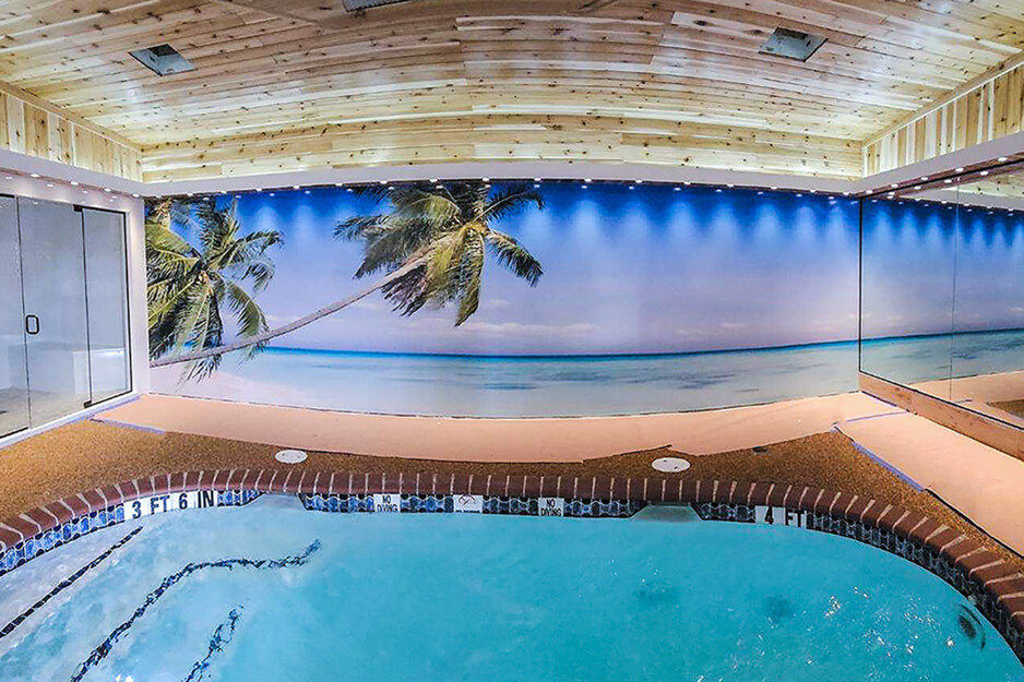 Indoor pool with island mural