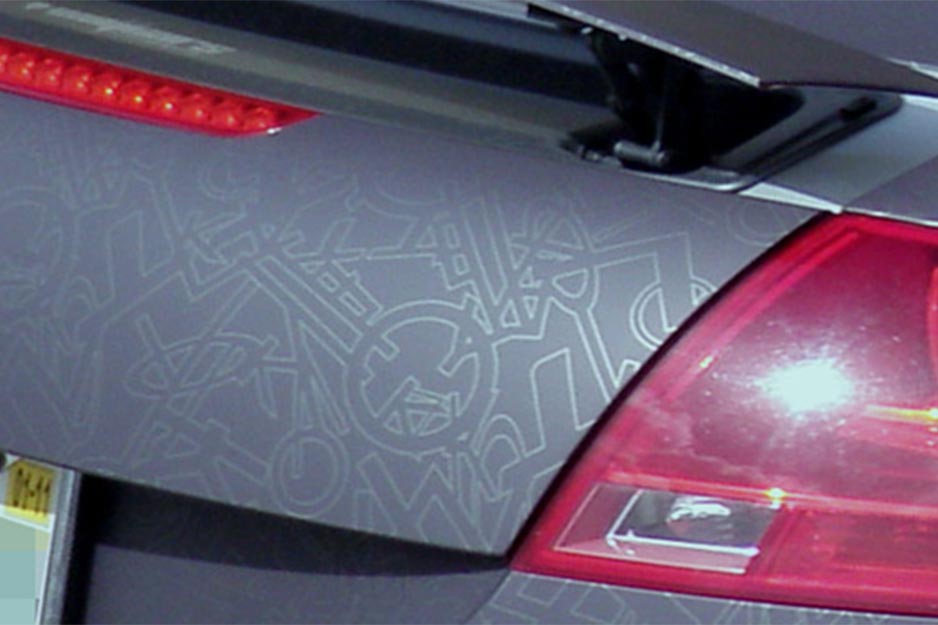Epic Sign Studio matte finish wrap with metallic pattern on 2009 Audi TT