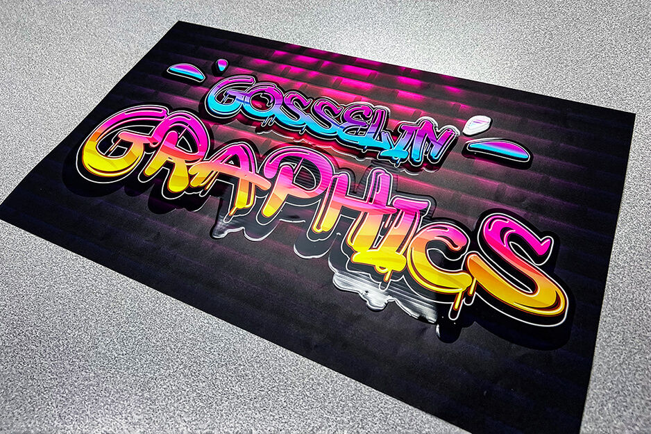 Holographic print of words "Gosselin Graphics" 