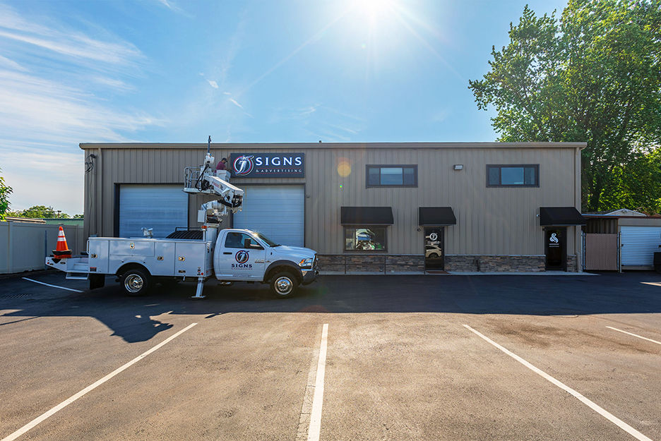 Exterior of J Signs with truck