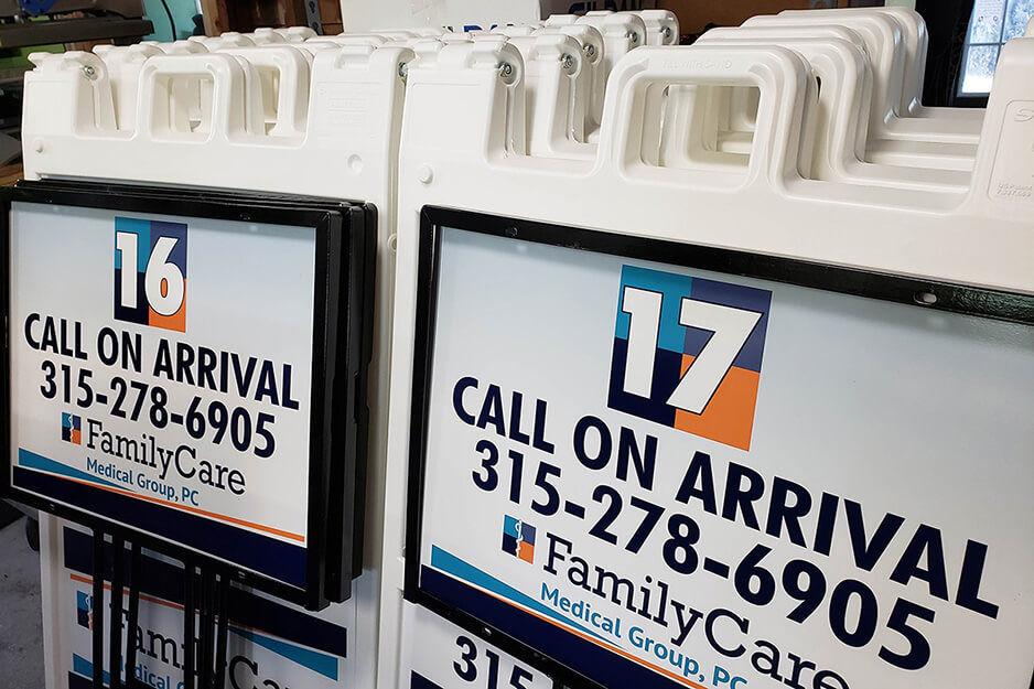 Two stacks of a-frame "call on arrival" signs for Family Care organization