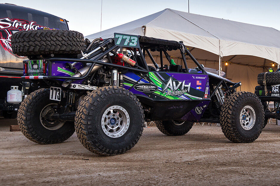 All terrain race vehicle with purple and green graphics