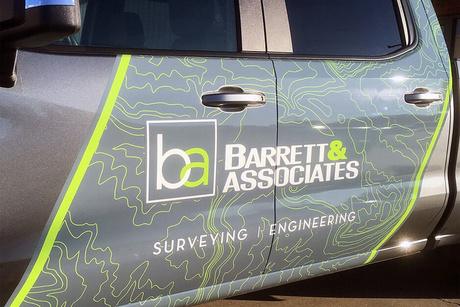 Sign Hub produces vehicle graphics like these on a pick up truck for Barrett & Associates on its Roland DG TrueVIS VG2-640 wide-format printer/cutter.