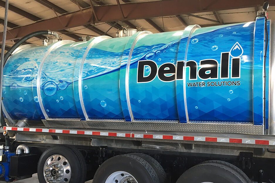 Sign Hub produced this blue water-themed tanker trailer wrap for its client, Denali, on its Roland DG TrueVIS VG2-640 wide-format printer/cutter.