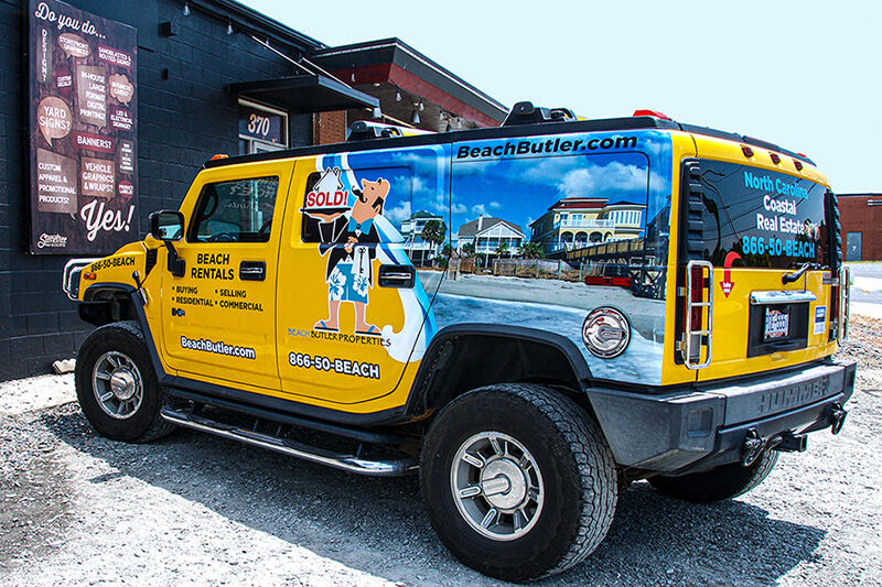 Jeep wrapped in vibrant graphics produced on a Roland DG VG2 printer/cutter.