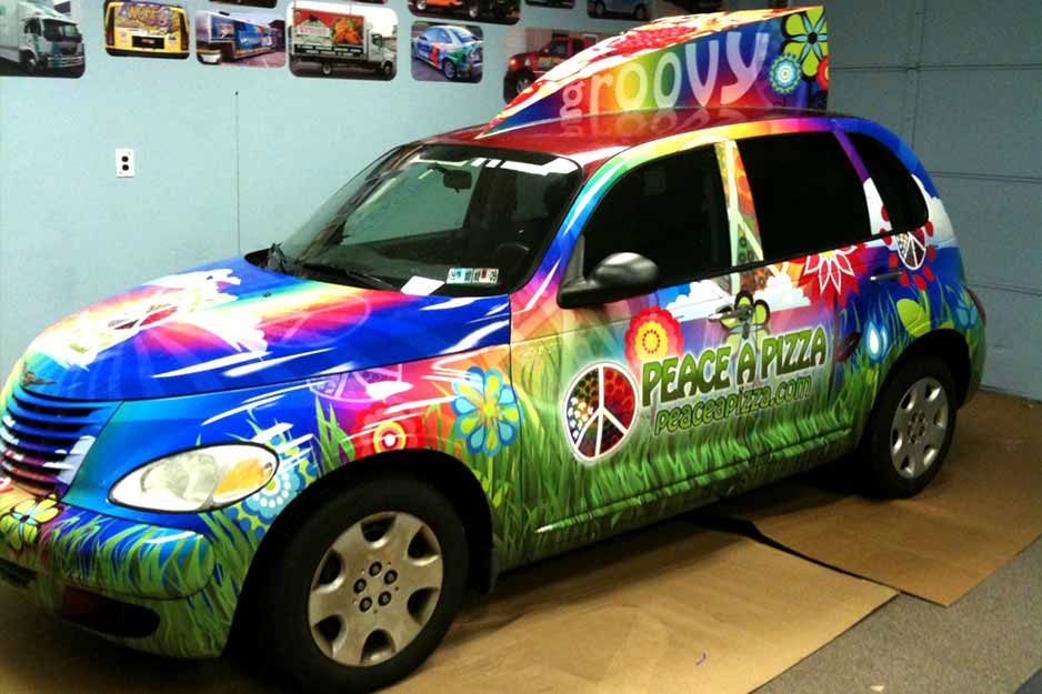 Sunrise Signs VersaCAMM vehicle wrap for Peace A Pizza