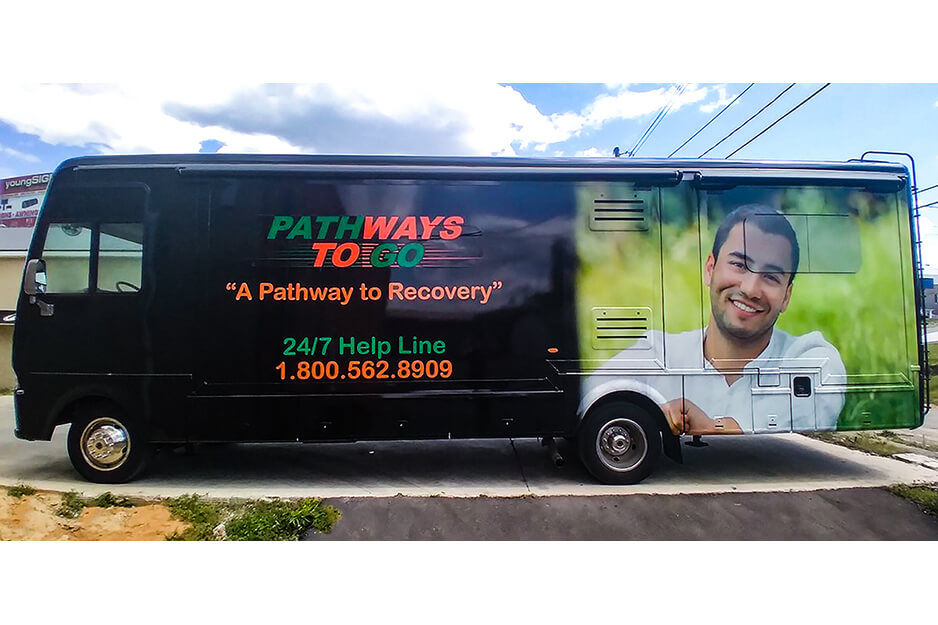 Young Signs used its Roland DG TrueVIS VG2 wide-format printer/cutter to create graphics for this Pathways bus wrap.