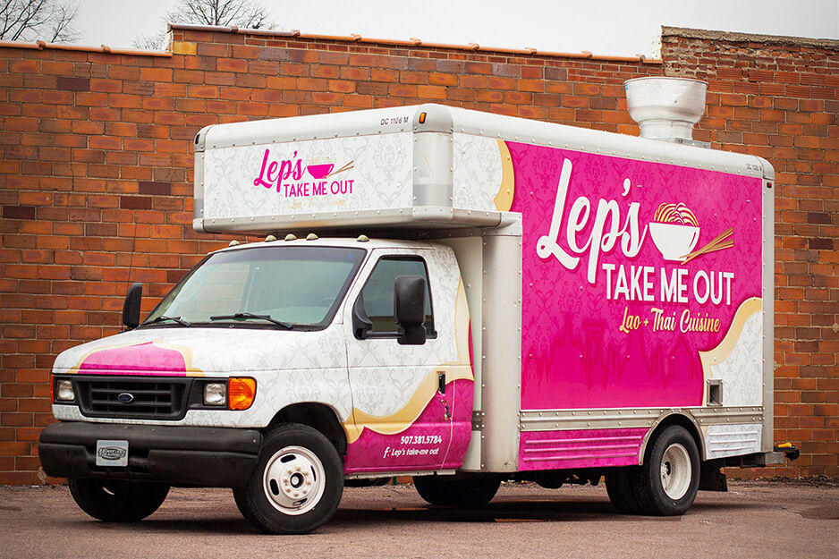 Pink box truck wrap by Fuel Graphics produced on its Roland DG TrueVIS VG2-540 digital printer/cutter